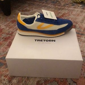 Brand new Tretorns with tags. blue/yellow combo.